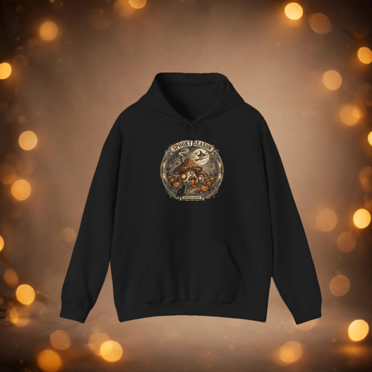 Haunted Harvest hoodie on warm taupe-caramel background